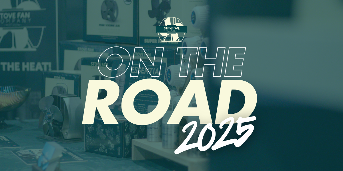 Promotional graphic featuring the Stove Fan Company’s product display with stove fans and fragrance products in the background. Bold text overlay reads "ON THE ROAD 2025" with the company logo above, announcing their 2025 event appearances.